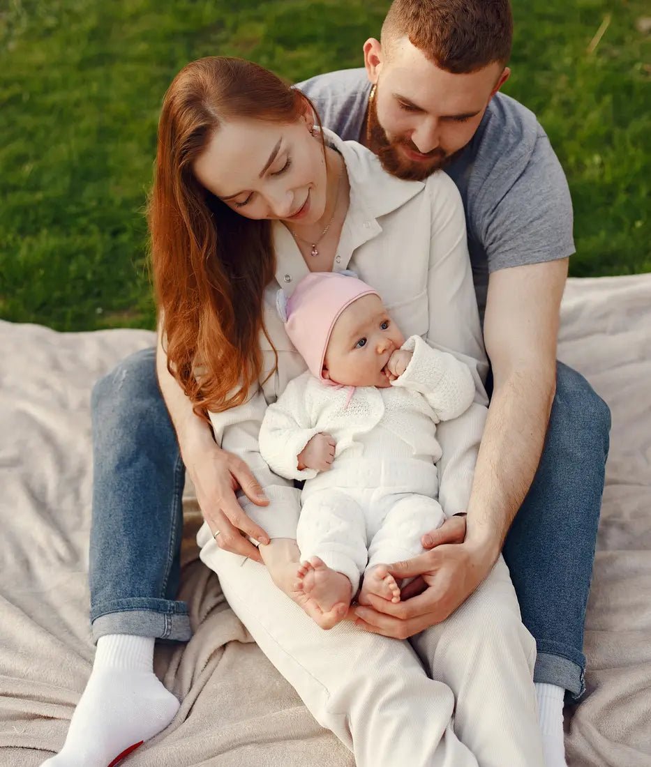 A family enjoying time together with their baby